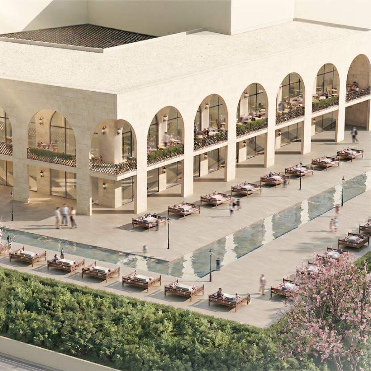 Outdoor plaza with arcades and water feature